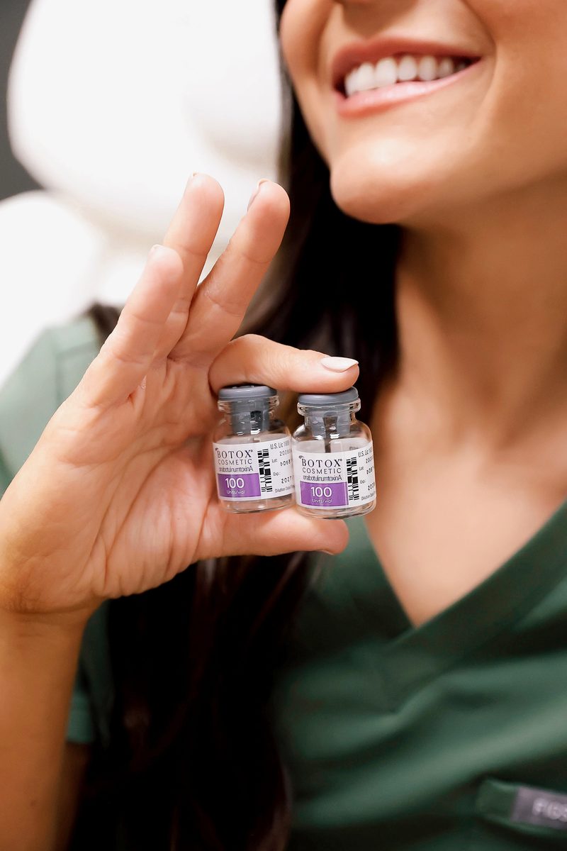 Paige Johnston RN holding genuine Allergan Botox Cosmetic vials at ICT Tox Wichita